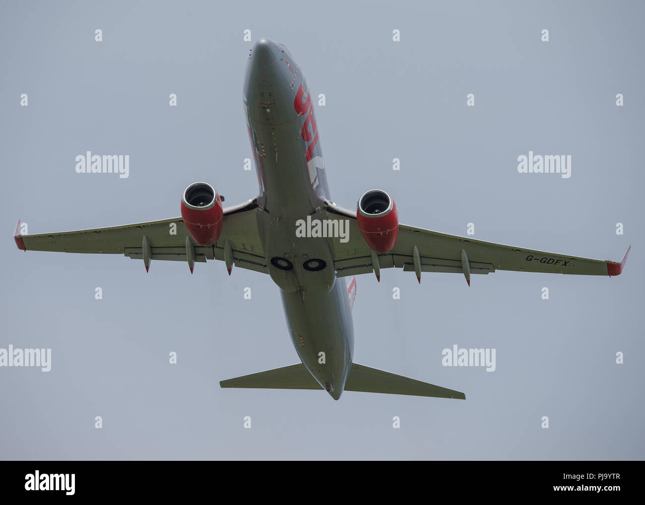Jet2 Airlines flight seen jetting off into a stormy sky from Glasgow