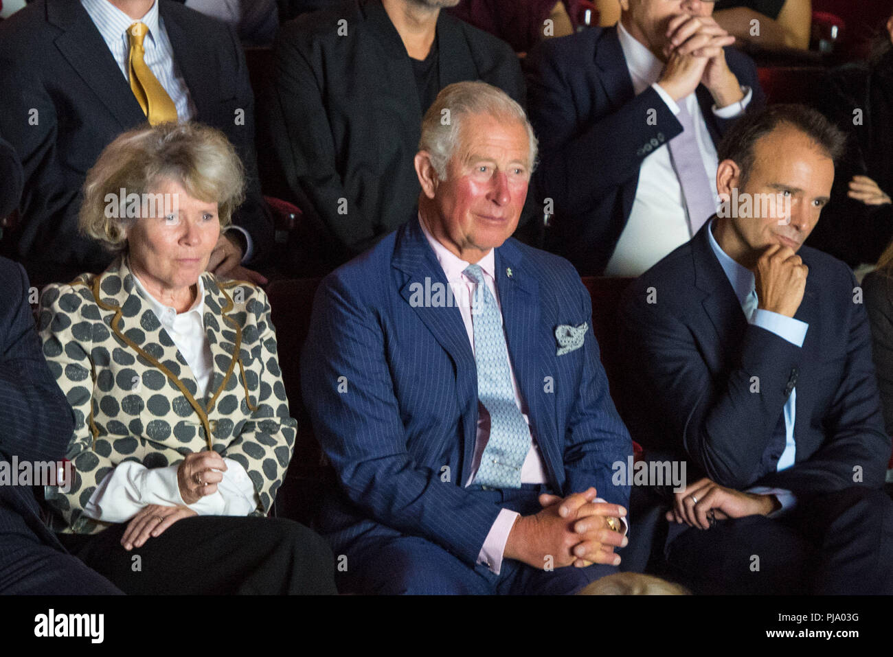 The Prince of Wales watches a performance alongside actress Imelda Staunton and Old Vic Artistic Director Matthew Warchus at the Old Vic Theatre, in central London, during a visit to mark the theatre's 200th anniversary. Stock Photo