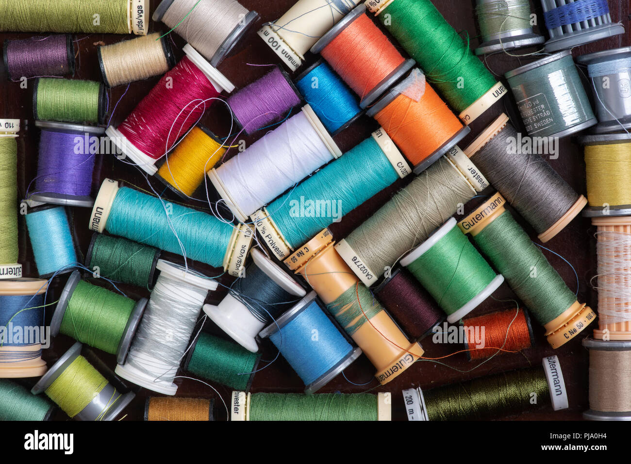 Old colourful cotton reels Stock Photo