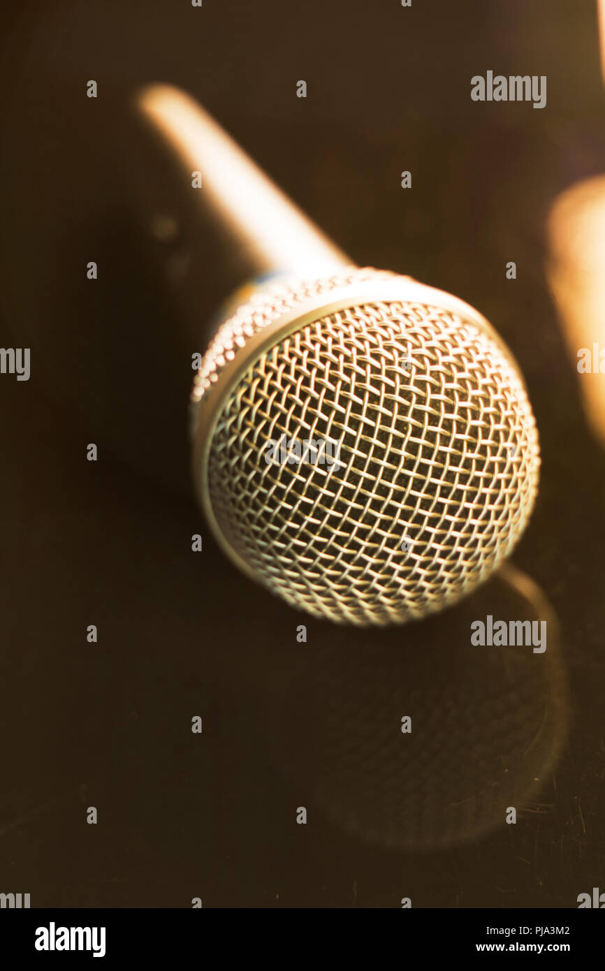 Retro microphone held in hi-res stock photography and images - Alamy