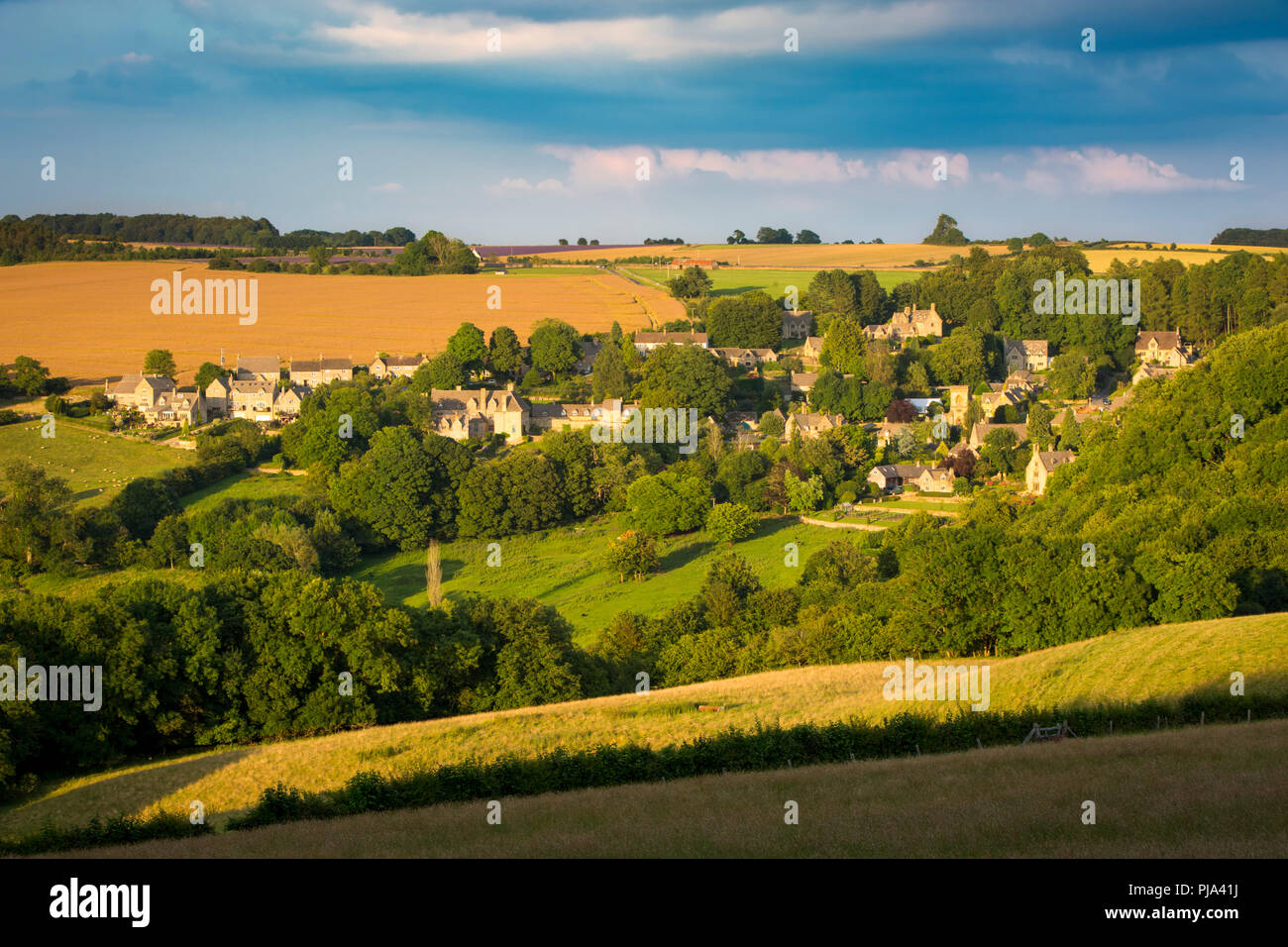 Setting sunlight over village of Snowshill, the Cotswolds, Gloucestershire, England Stock Photo
