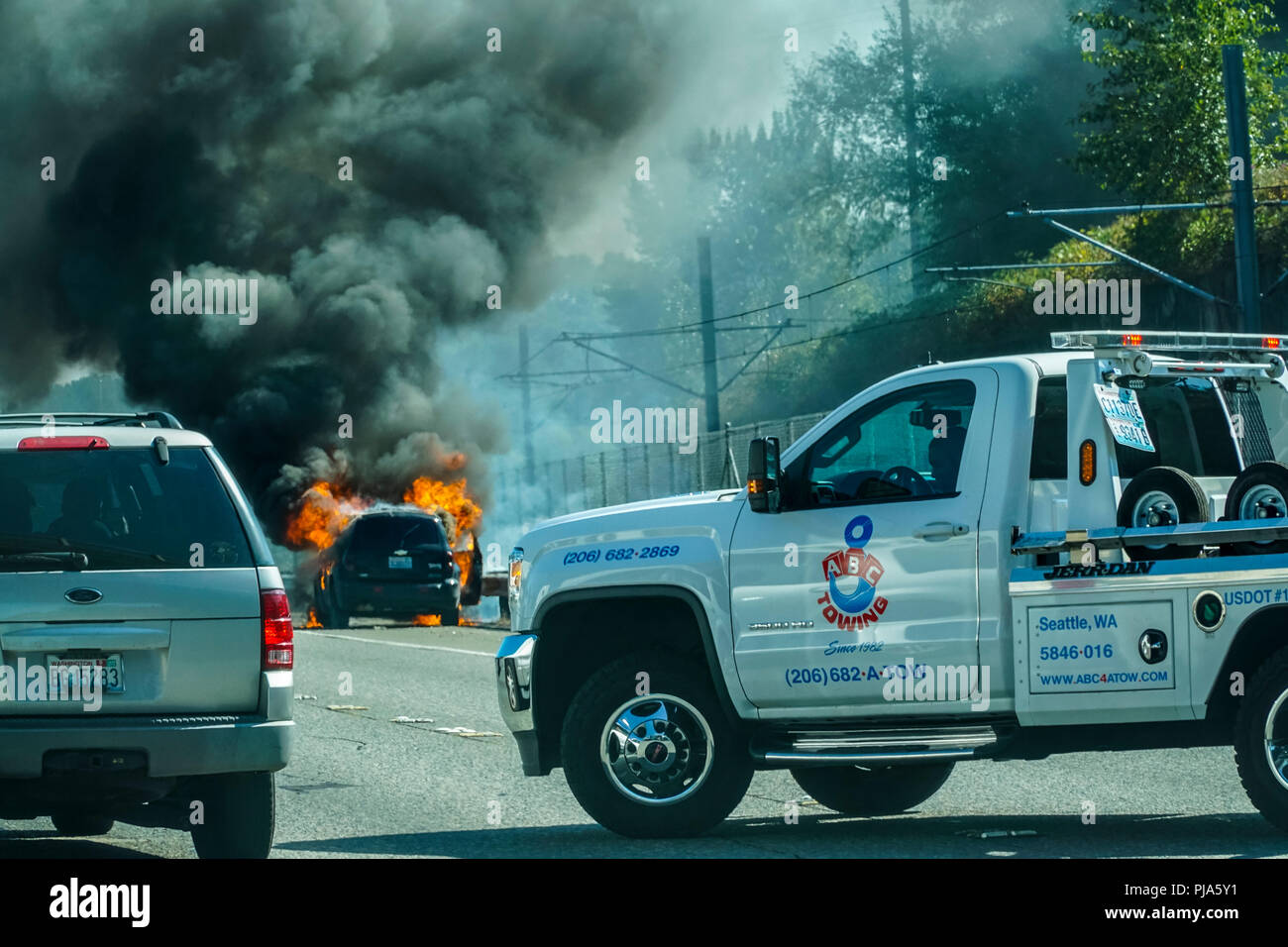 A Chevy HSR on fire on Interstate 5 in Seattle Washington USA Stock Photo