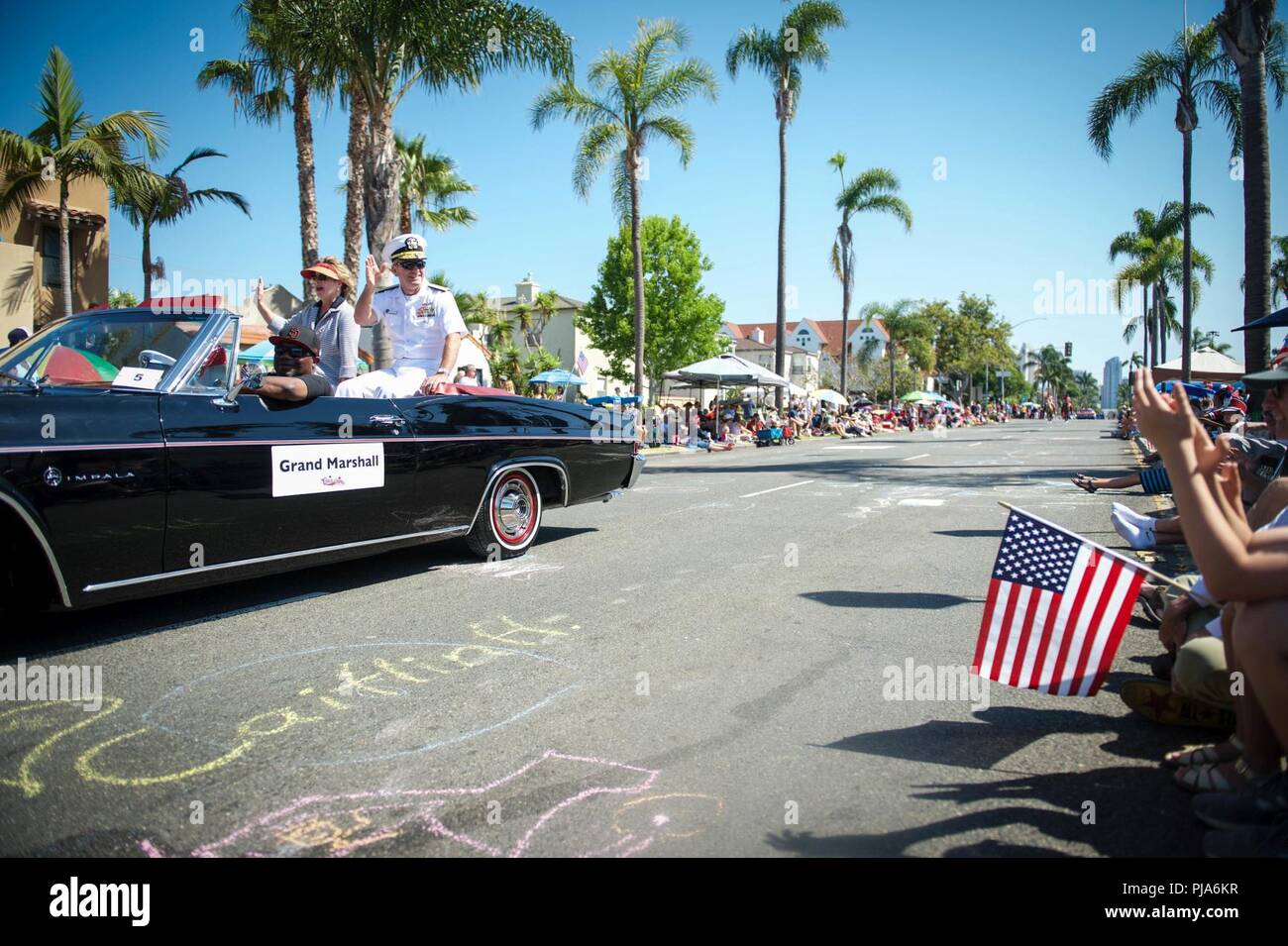 CORONADO, Calif. (July 4, 2018) Vice Adm. Richard Brown, commander, Naval Surface Force, U.S. Pacific (CNSP) Fleet serves as grand marshal for the 70th Annual Independence Day Parade. Brown's role as CNSP is to man, train, and equip the Surface Force to provide Fleet Commanders with credible naval power to control the sea and project power ashore. Stock Photo