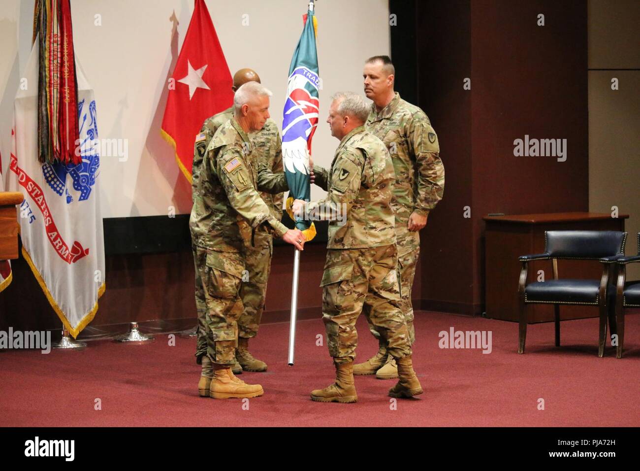 During a Change of Responsibility ceremony on July 3, the U.S. Army Aviation and Missile Command honored outgoing Command Sgt. Maj. Michael O’Donnell, and welcomed its eighth Command Sergeant Major, Command Sgt. Maj. George “Mike” Dove. Maj. Gen. Doug Gabram, AMCOM commander, thanked O’Donnell for his 30 years of service to the Nation, and the legacy he leaves behind in the Soldiers and civilians he has touched throughout his career. “The knowledge and skills will be difficult to replace, but he has trained us well. The words of the Noncommissioned Officer Creed embodies Command Sgt. Maj. O’Do Stock Photo