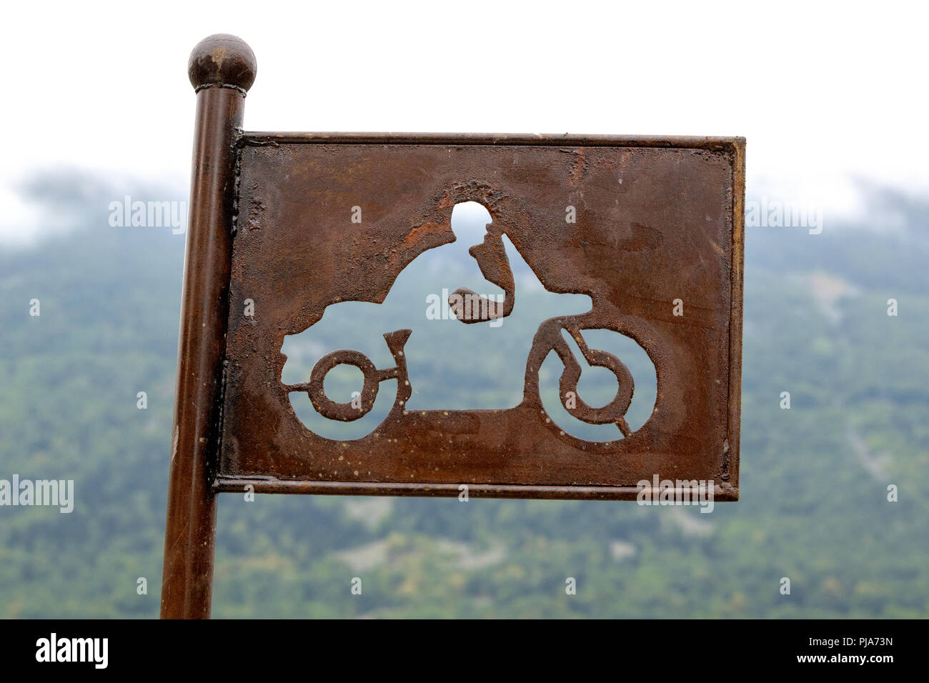 French Village road signs for motorbikes. LUZ-SAINT SAUVER - Les Pyrénées. Rusted effect, Punched out, old sign .       Interdit, Forbidden, allowed, Stock Photo