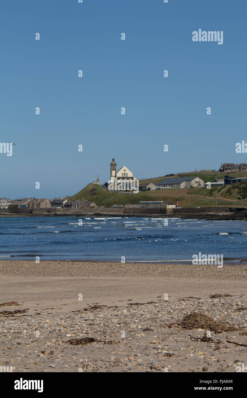 Looking across the mouth of the River Deveron towards Macduff from the beach in Banff, Aberdeenshire, Scotland, UK. Stock Photo