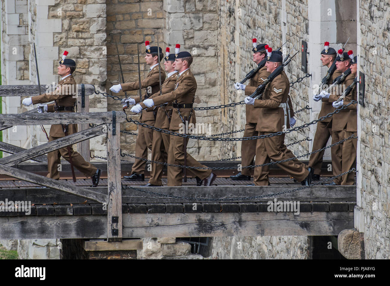 London, UK. 5th September 2018. Marching out of the East Gate of the Tower of London - The Royal Regiment of Fusiliers exercise their right to march through the Square Mile as one of the City of London’s Privileged Regiments to celebrate their 50th anniversary. This includes the right to march through the City of London with drums beating, colours flying and bayonets fixed in a parade from the Tower of London to the Guildhall. Credit: Guy Bell/Alamy Live News Stock Photo
