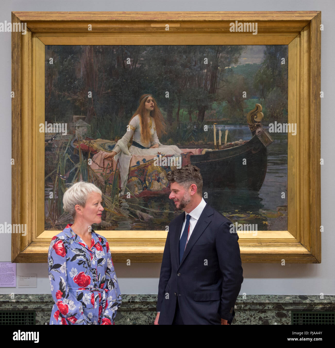 Tate Britain, London, UK. 5 September, 2018. The new Director of the National Gallery of Australia, Nick Mitzevich, and Director of Tate, Maria Balshaw, with John William Waterhouse’s The Lady of Shalott 1888 to mark the launch of a major new exhibition at the National Gallery of Australia. Over forty works from Tate Britain’s collection of Pre-Raphaelite art will be loaned to the National Gallery of Australia in December for a major new exhibition. Credit: Malcolm Park/Alamy Live News. Stock Photo