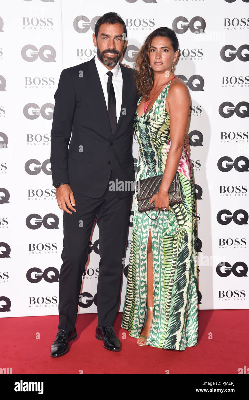 LONDON, UK. September 05, 2018: Robert Pires & wife at the GQ Men of the Year Awards 2018 at the Tate Modern, London Credit: Sarah Stewart/Alamy Live News Stock Photo