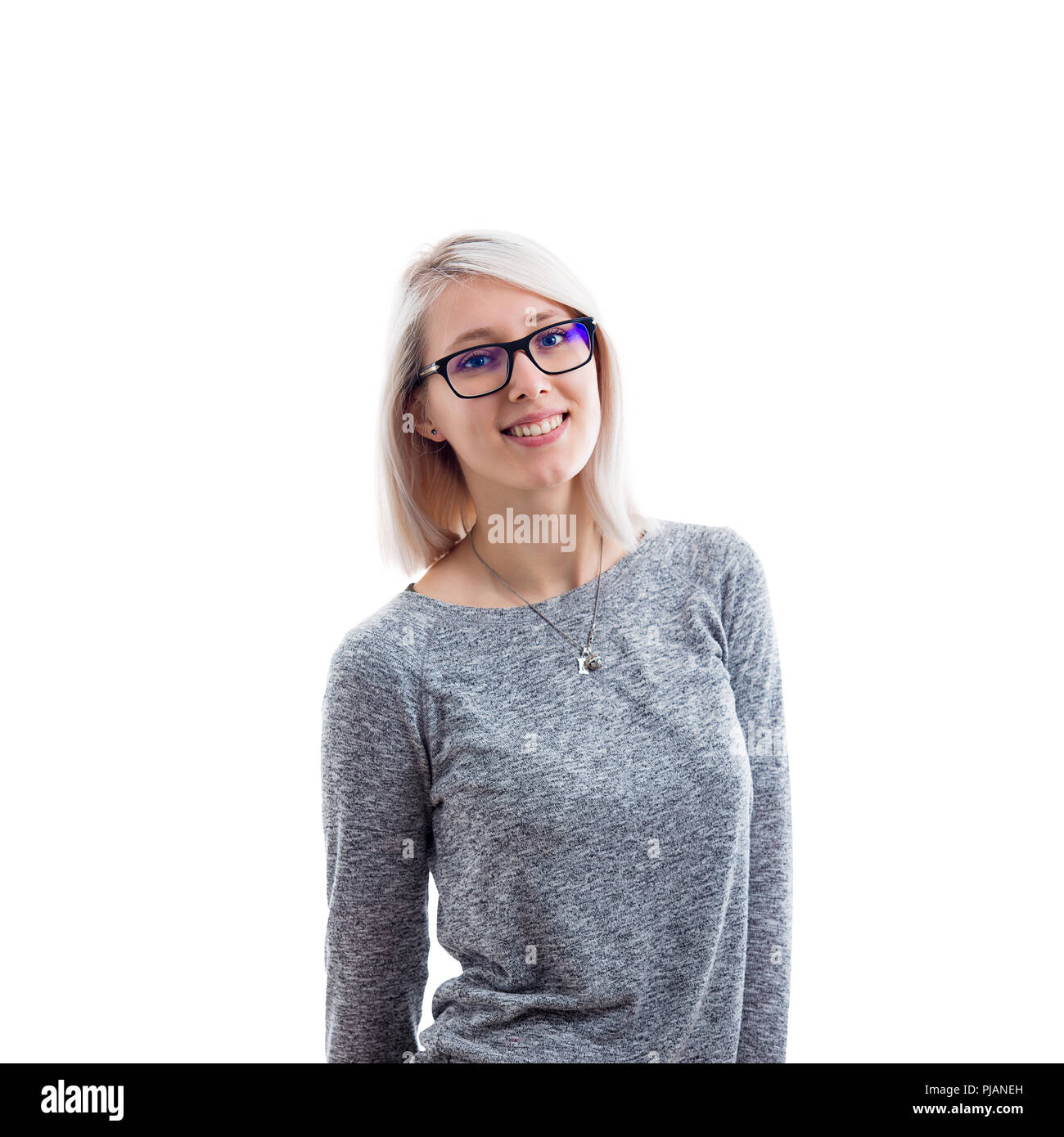 Beautiful cheerful young girl posing, wearing glasses isolated on white background. Stock Photo
