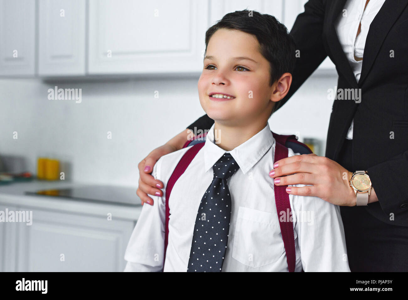 Child school uniform adult home hi-res stock photography and images - Alamy