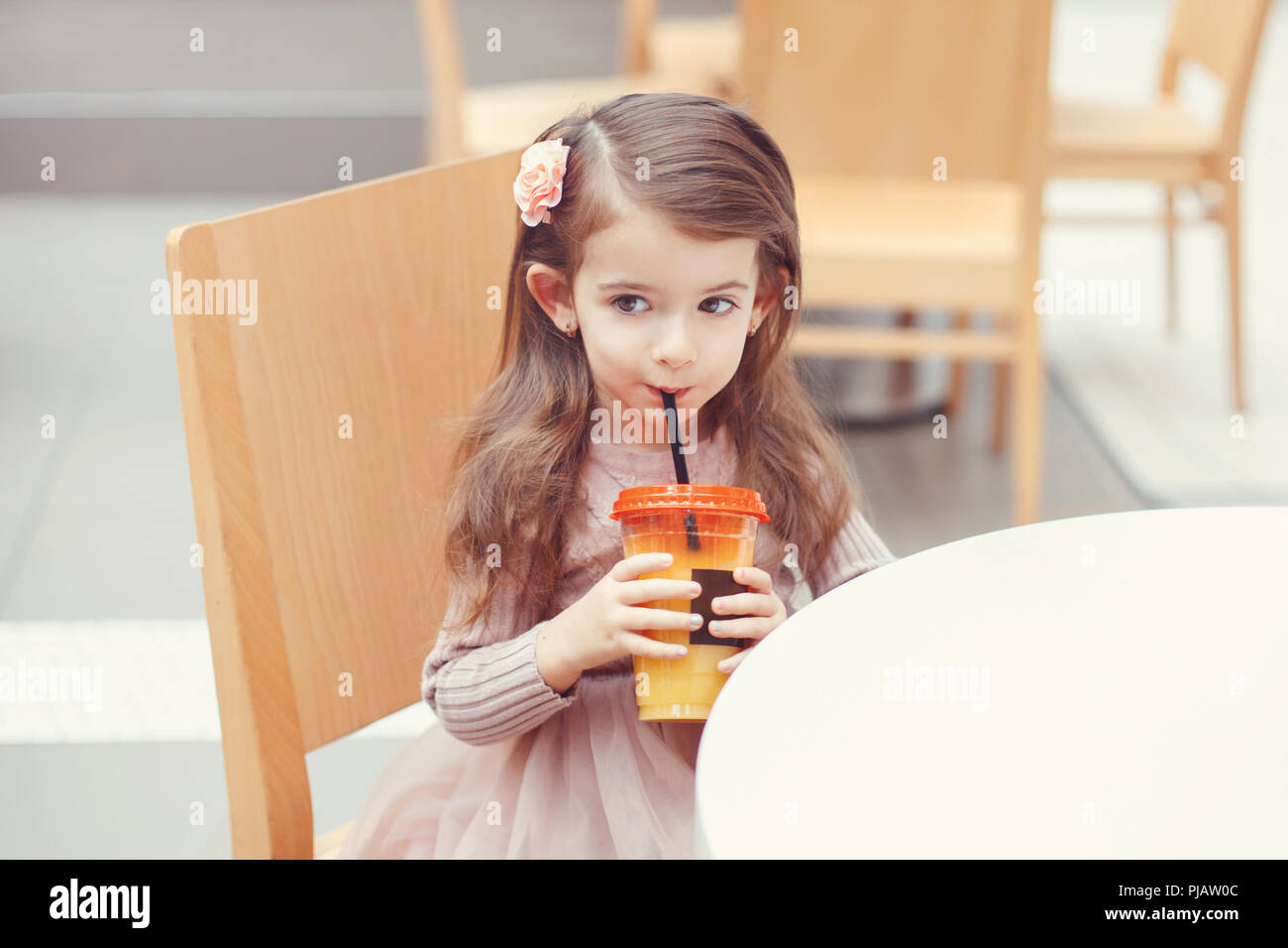 Portrait Of Cute Adorable Little Caucasian Girl With Long Hair