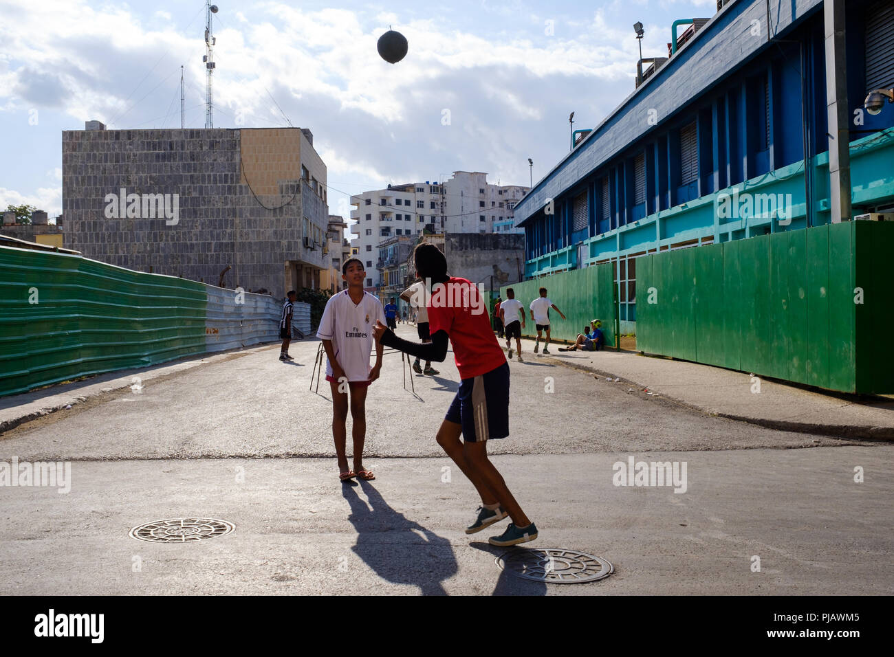 HAVANA, CUBA - CIRCA MARCH 2017:  Boys playing soccer in the streets of  Havana. This is very typical around town. Stock Photo
