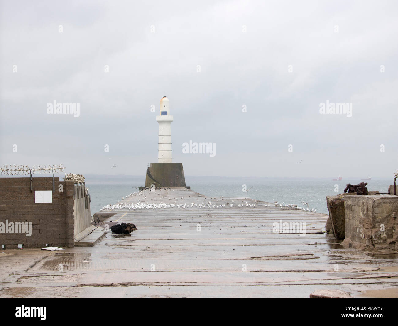 Aberdeen Lighthouse on Cloudy Day Stock Photo