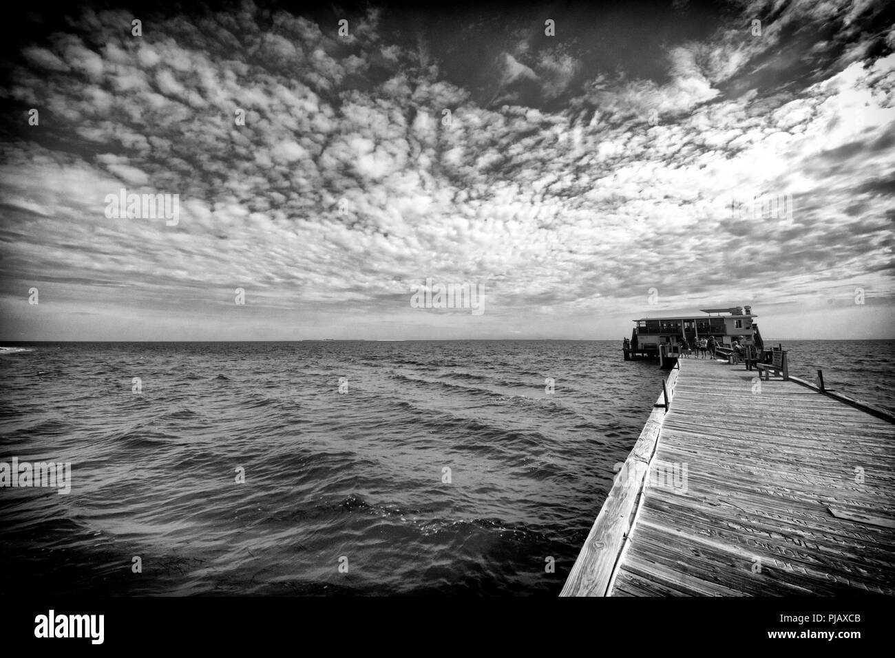 The Rod and Reel Pier is a popular tourist attraction in picturesque Anna Maria Island, on the Gulf cost of Florida, USA Stock Photo