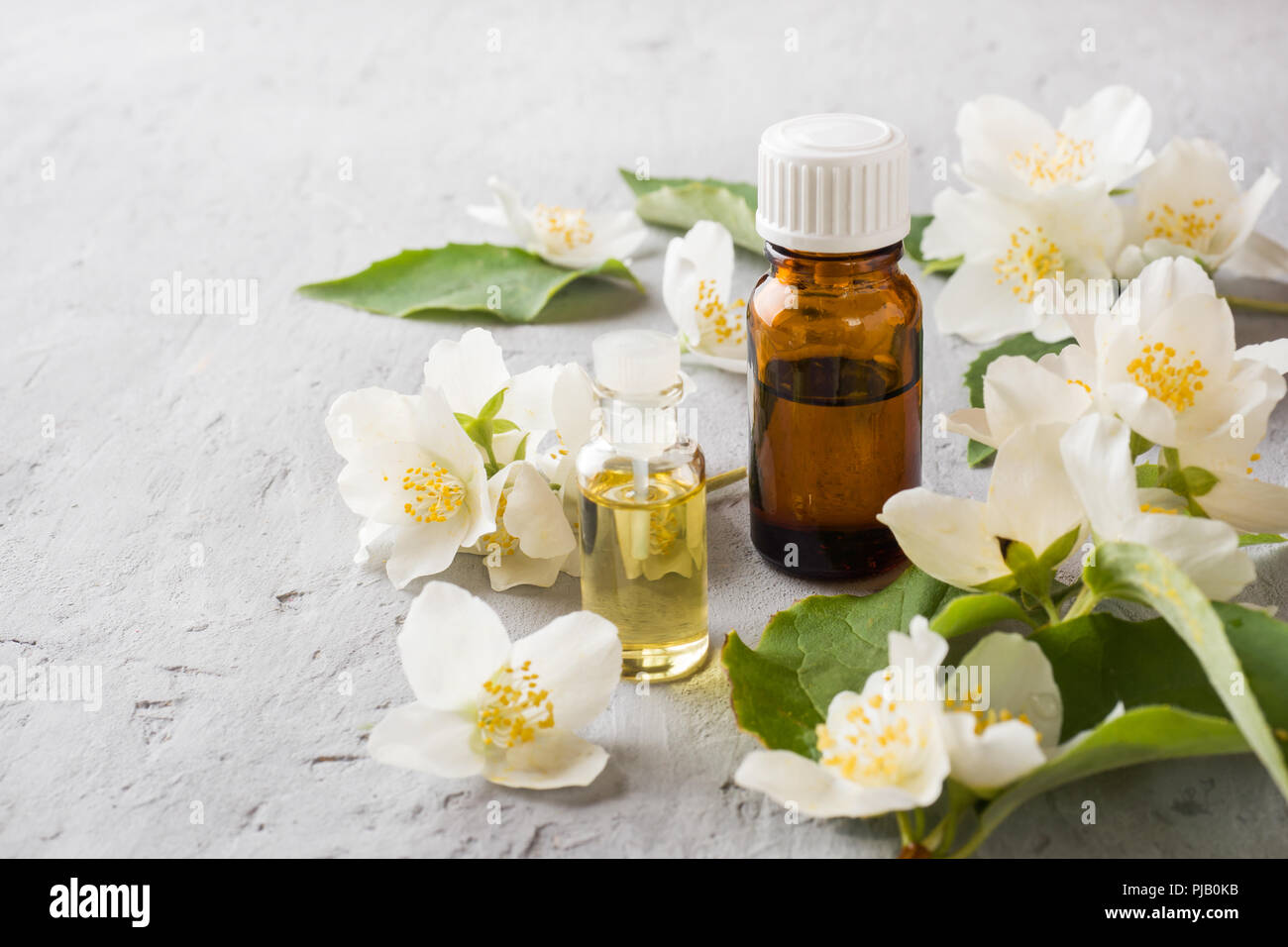 Jasmine oil. Aromatherapy with Jasmine oil and soap. Jasmine flower