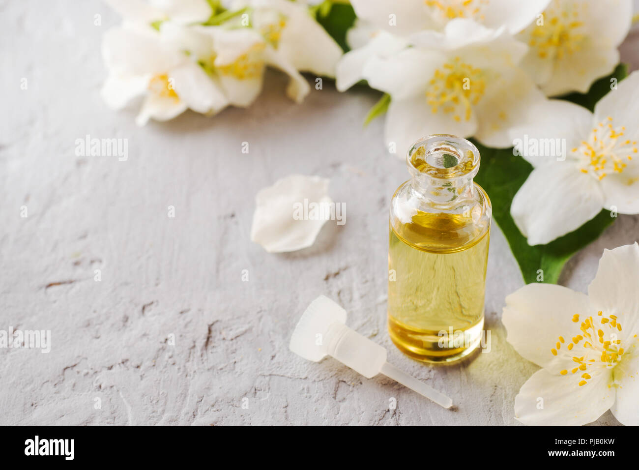 Jasmine oil. Aromatherapy with Jasmine oil and soap. Jasmine flower