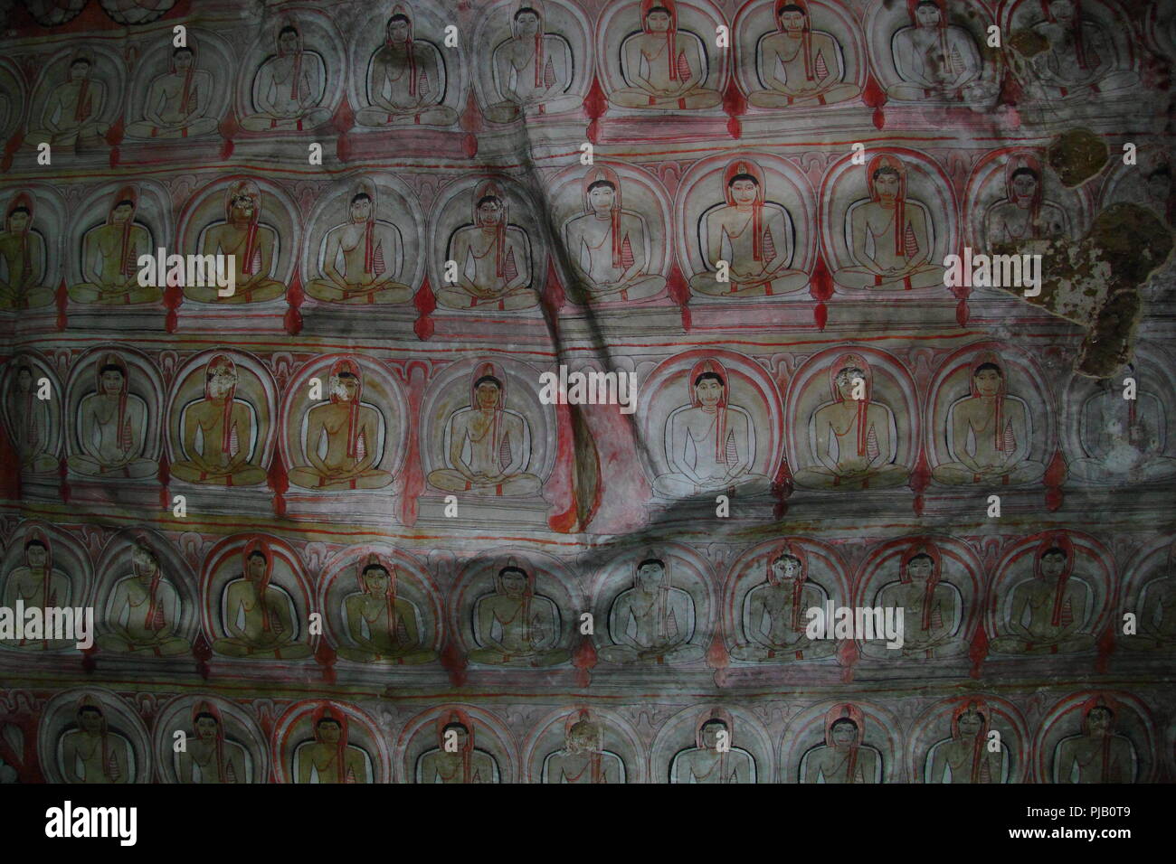 Ancient Buddha paintings in the cave temple (Dambulla, Sri Lanka) Stock Photo