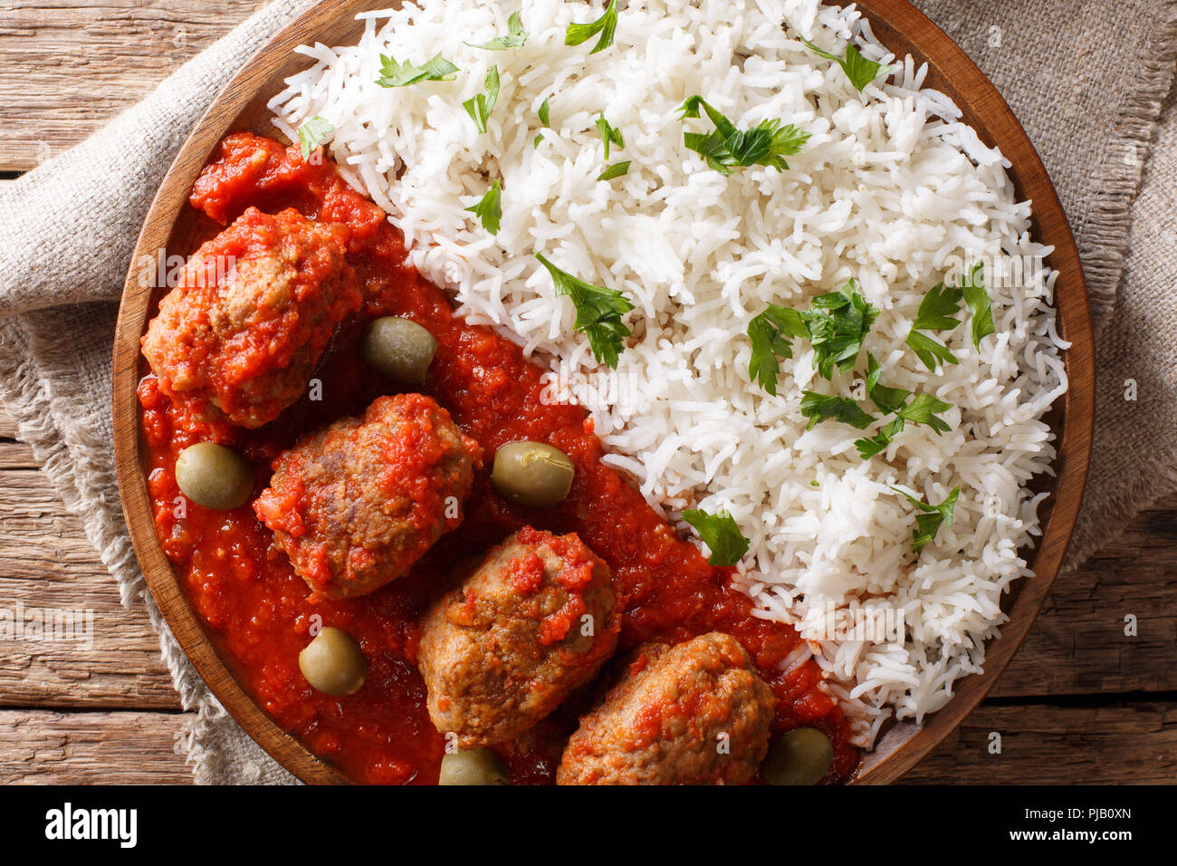 Traditional Soutzoukakia recipe (Greek baked Meatballs in tomato sauce