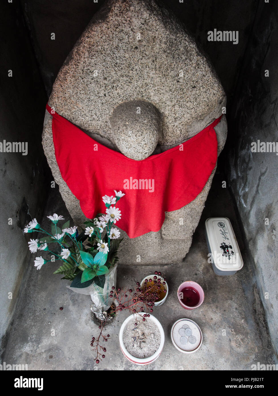 Buddhist statue at roadside shrine, henro no michi trail, Shikoku 88