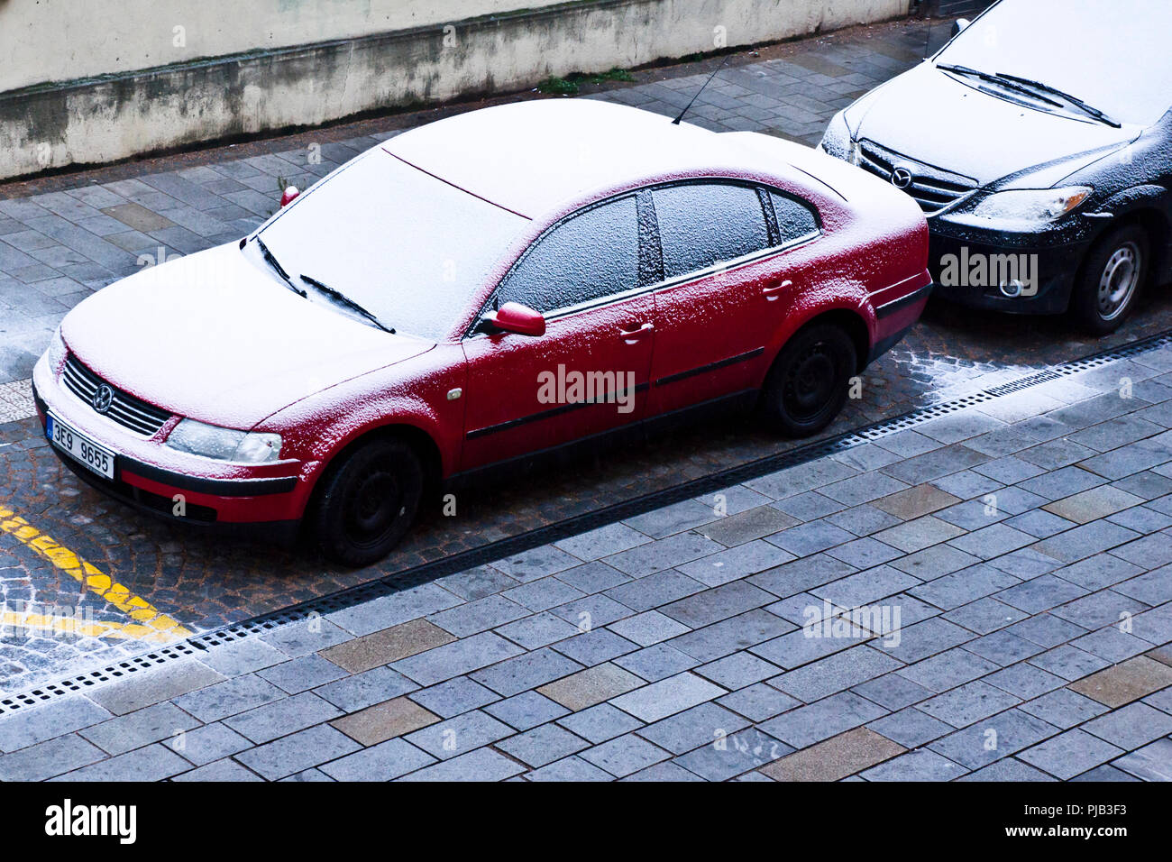 cars parked on the street and covered with snow Stock Photo - Alamy