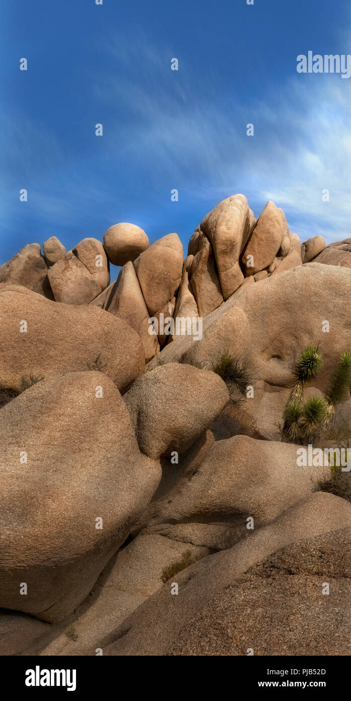 A vertical view of an iconic pile of granite boulders at Joshua Tree National Park California Stock Photo