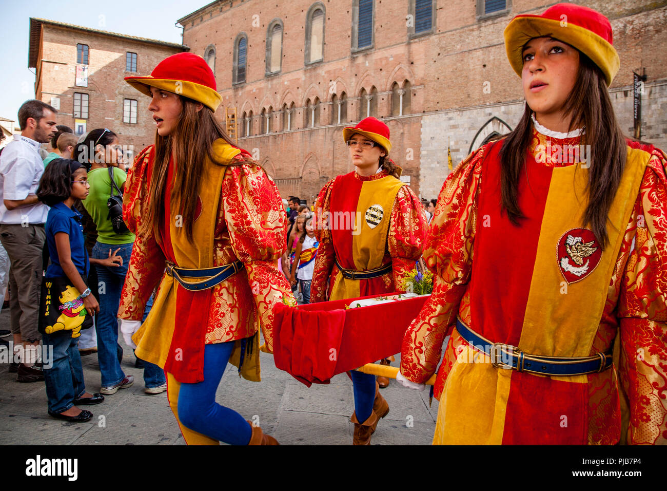 Contrada Children Take Part In The Cero Votivo Procession, The Palio di Siena, Siena, Italy Stock Photo