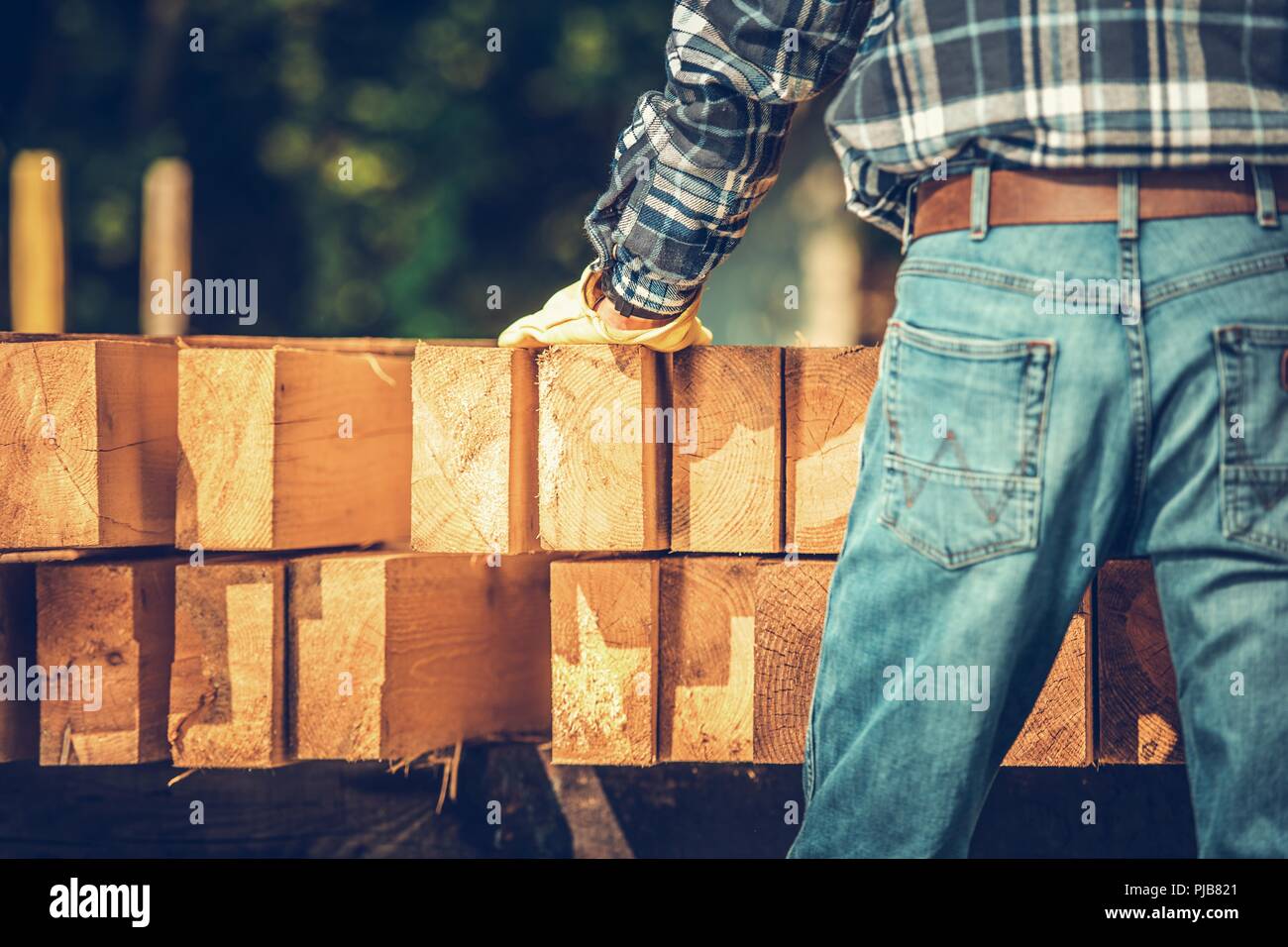 Carpenter Wood Material. Woodworking Contractor Preparing for the Construction Job. Stock Photo