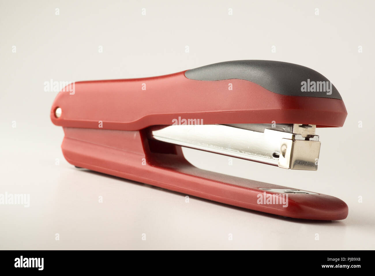 new stapler for stapling papers on a table Stock Photo