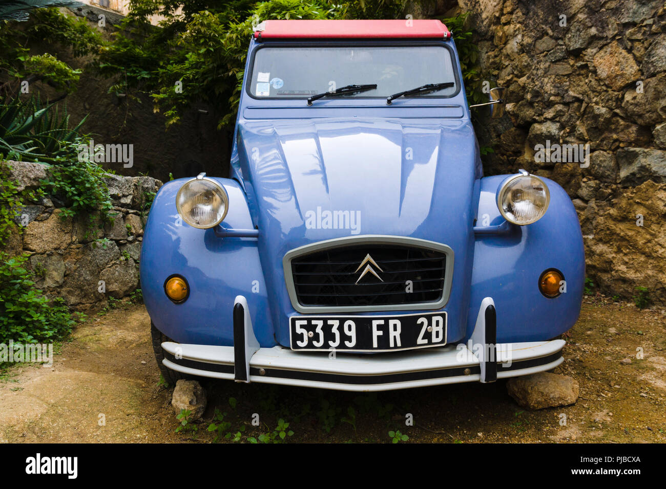 Blue Citroën 2CV car in Pigna, Corsica, France Stock Photo