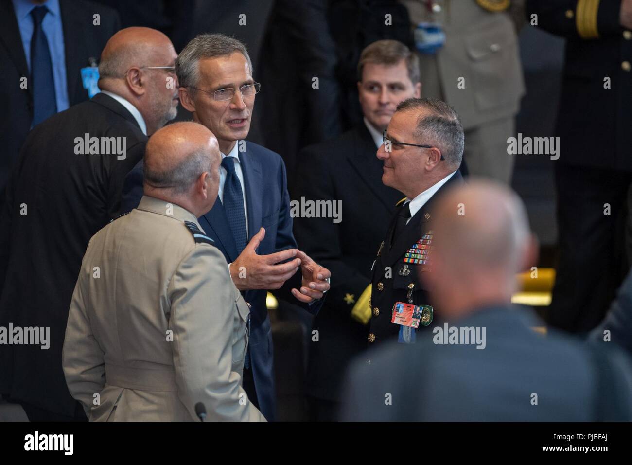 General Curtis M. Scaparrotti, Supreme Allied Commander Europe, chats with Jens Stoltenberg, NATO Secretary General, and Air Chief Marshal Sir Stuart Peach, Chairman of the NATO Military Committee, during the Brussels Summit at NATO HQ, Brussels, Belgium, July 11, 2018. General Scaparrotti attended the Brussels Summit to provide military guidance to the North Atlantic Council and to meet with military and political leadership from throughout the Alliance. (NATO Stock Photo