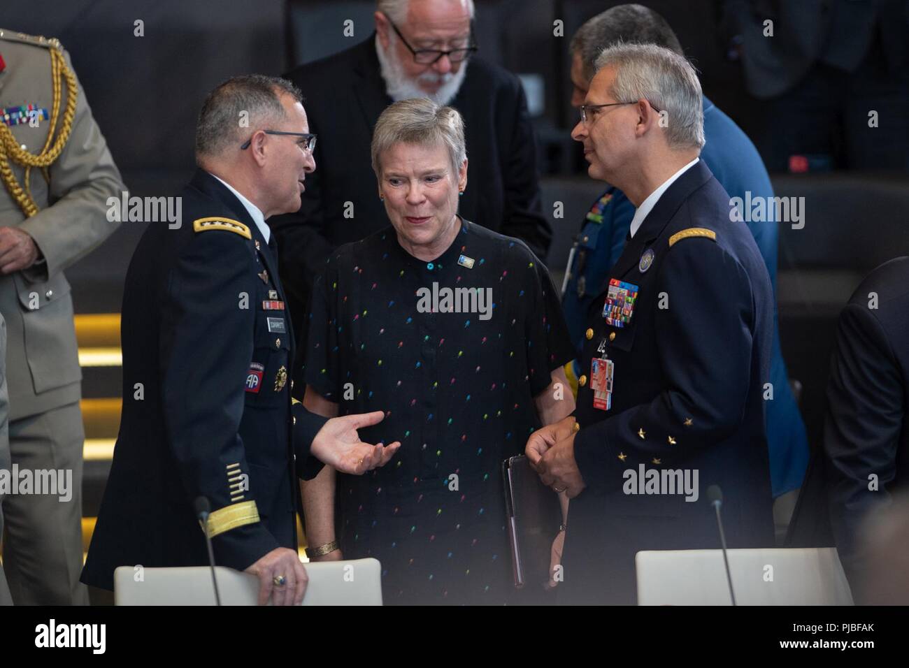 General Curtis M. Scaparrotti, Supreme Allied Commander Europe, and General Denis Mercier, Supreme Allied Commander Transformation, speak with Rose Gottemoeller, deputy secretary general of NATO, during the Brussels Summit at NATO HQ, Brussels, Belgium, July 11, 2018. General Scaparrotti attended the Brussels Summit to provide military guidance to the Atlantic Council and to meet with military and political leadership from throughout the Alliance. (NATO Stock Photo