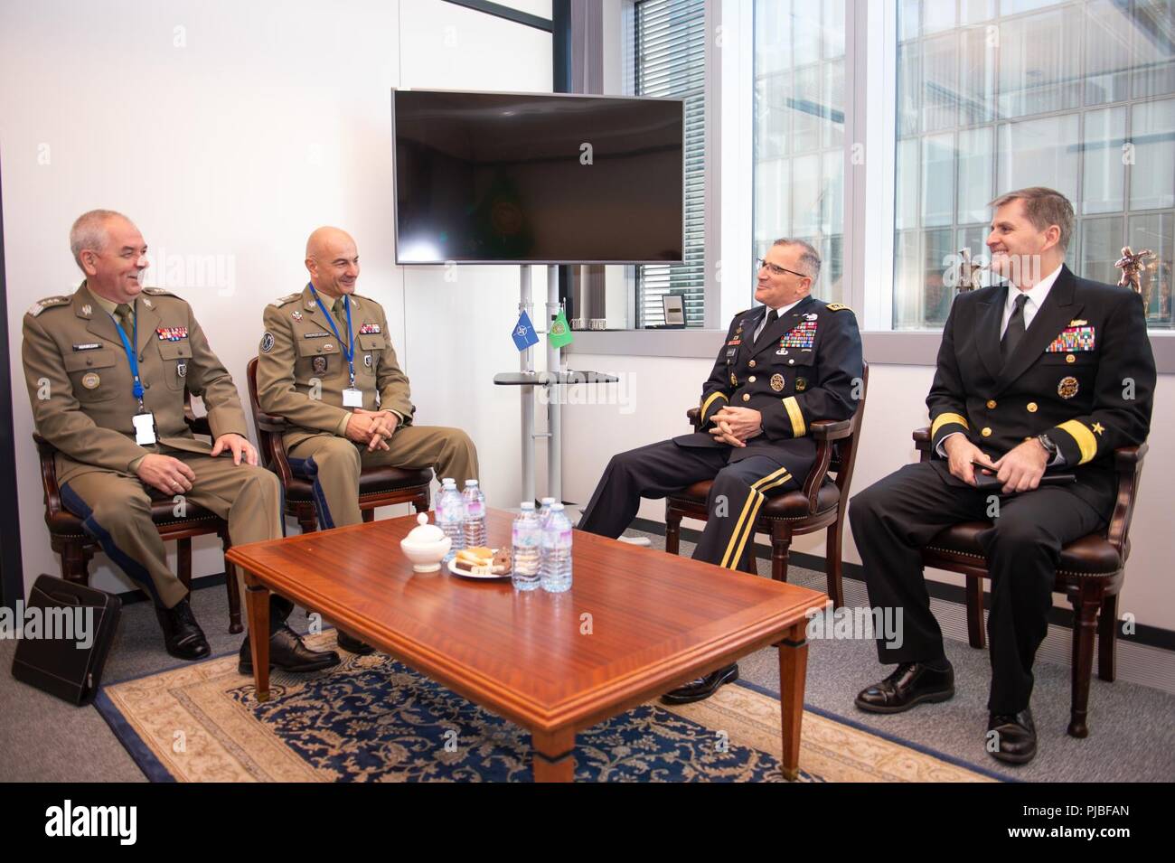 General Curtis M. Scaparrotti, Supreme Allied Commander Europe, meets with Lieutenant General Rajmund Andrzejczak, Polish Armed Forces chief of defence, and Lieutenant General Janusc Adamczak, Polish Military Representative, at NATO HQ, Brussels, Belgium, during the Brussels Summit, July 11, 2018. General Scaparrotti attended the Brussels Summit to provide military guidance to the Atlantic Council and to meet with with military and political leadership from throughout the Alliance. (NATO Stock Photo
