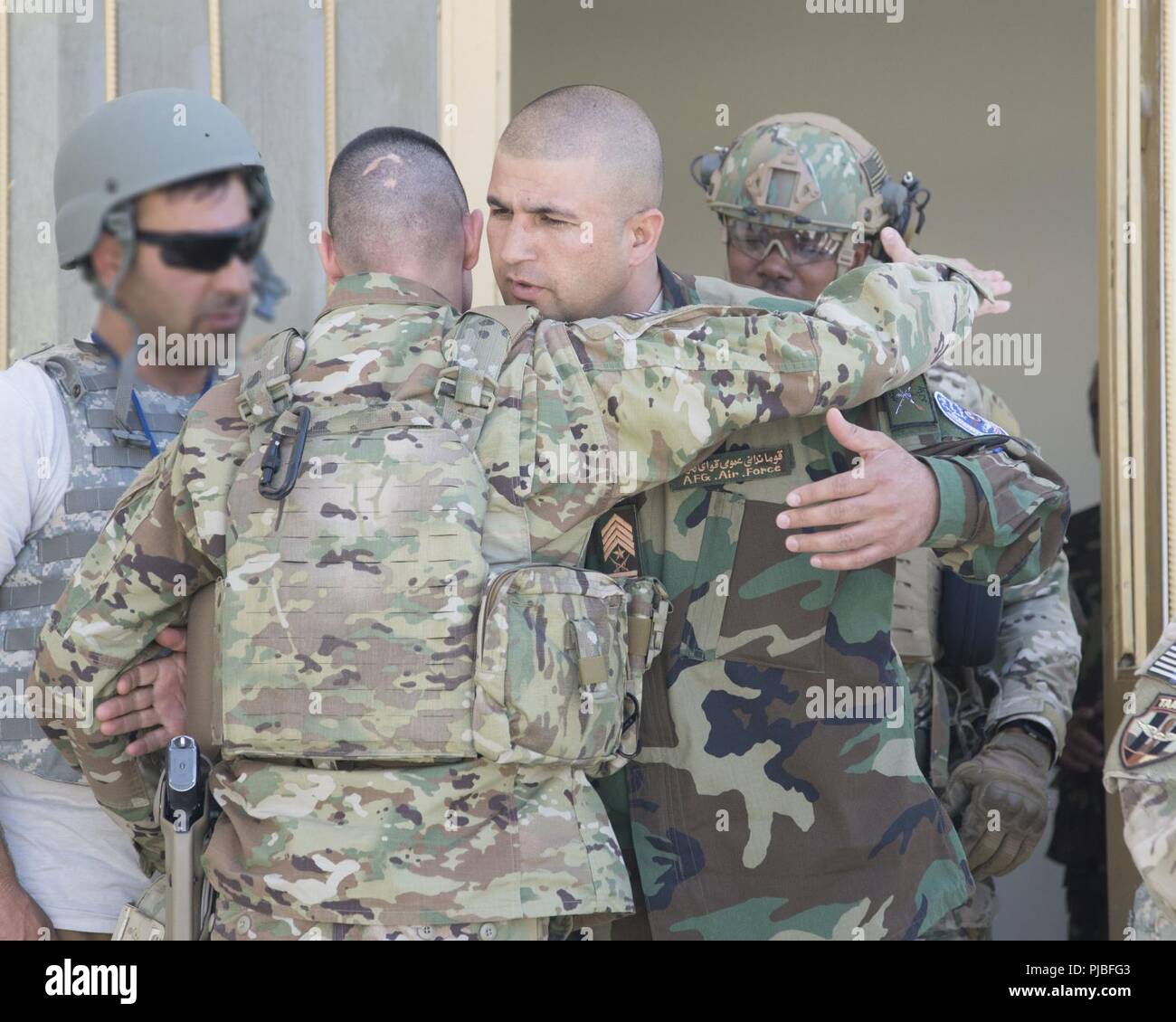 KABUL, Afghanistan (July 11, 2018) -- Chief Master Sergeant Shawn Drinkard, Command Chief Master Sergeant for the U.S. Air Forces Central Command (AFCENT), met with Train, Advise and Assist Command-Air (TAAC-Air) and Afghan Air Force (AAF) enlisted personnel July 11, 2018, Kabul Air Wing, Afghanistan. Drinkard discussed various topics, including the importance of relationships and empowering the enlisted members of both militaries. Stock Photo