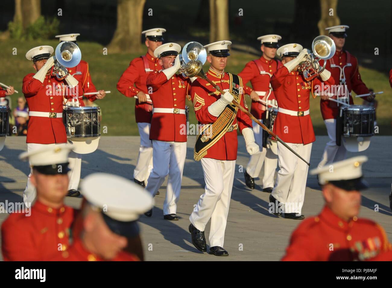 Marines with “The Commandant’s Own,” U.S. Marine Drum & Bugle Corps play a musical ballad during a Tuesday Sunset Parade at the Lincoln Memorial, Washington D.C., July 10, 2018. The guest of honor for the parade was the former Vice President of the U.S., Joe Biden, and the hosting official was the Staff Judge Advocate to the Commandant of the Marine Corps, Maj. Gen. John R. Ewers Jr. Stock Photo