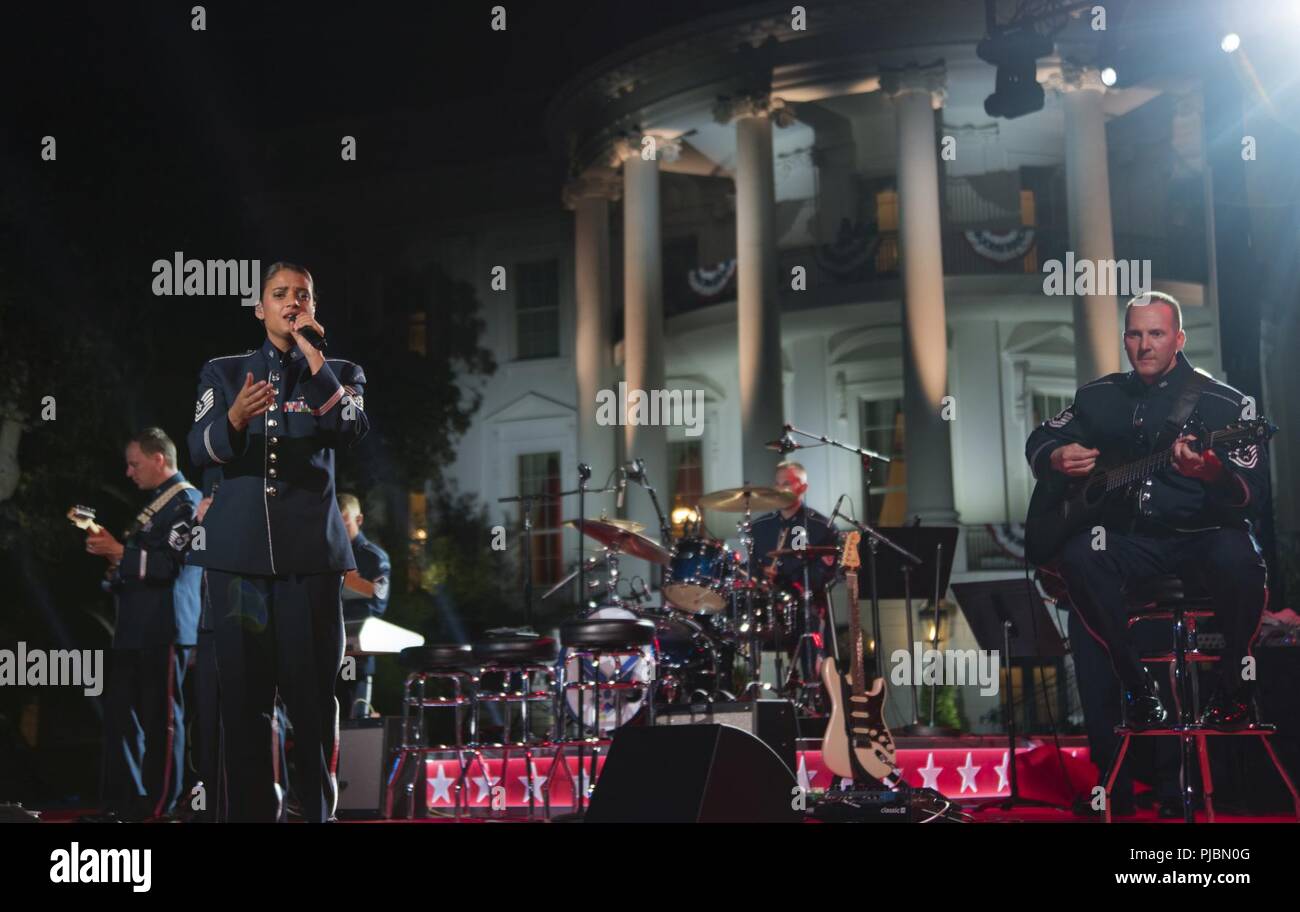The U.S Air Force premier rock band, Max Impact, performs at the White House in Washington, July 4, 2018. Max Impact performed on Independence Day to honor veterans and inspire patriotism. Stock Photo
