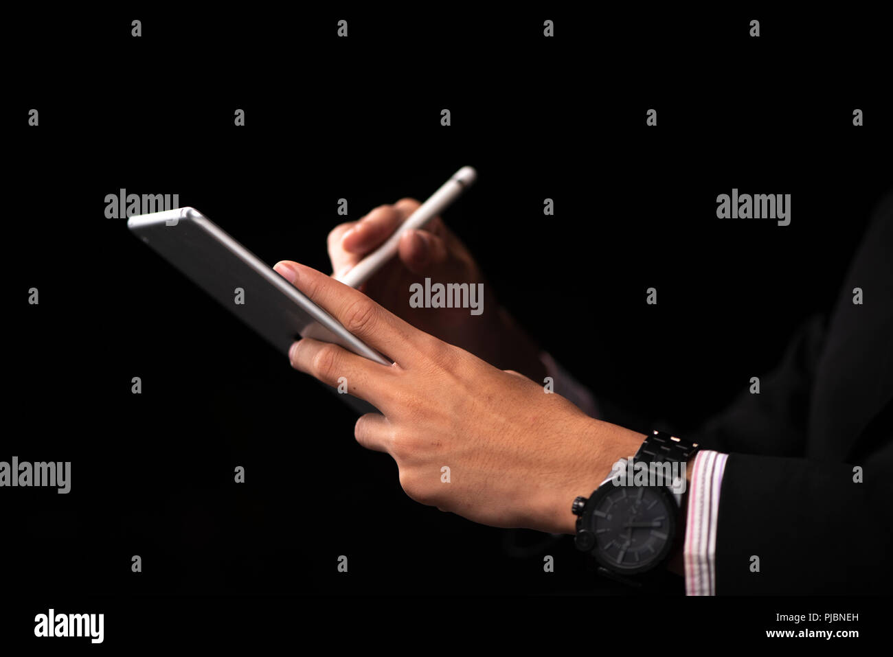 businessman using tablet smartphone for working in the office Stock Photo