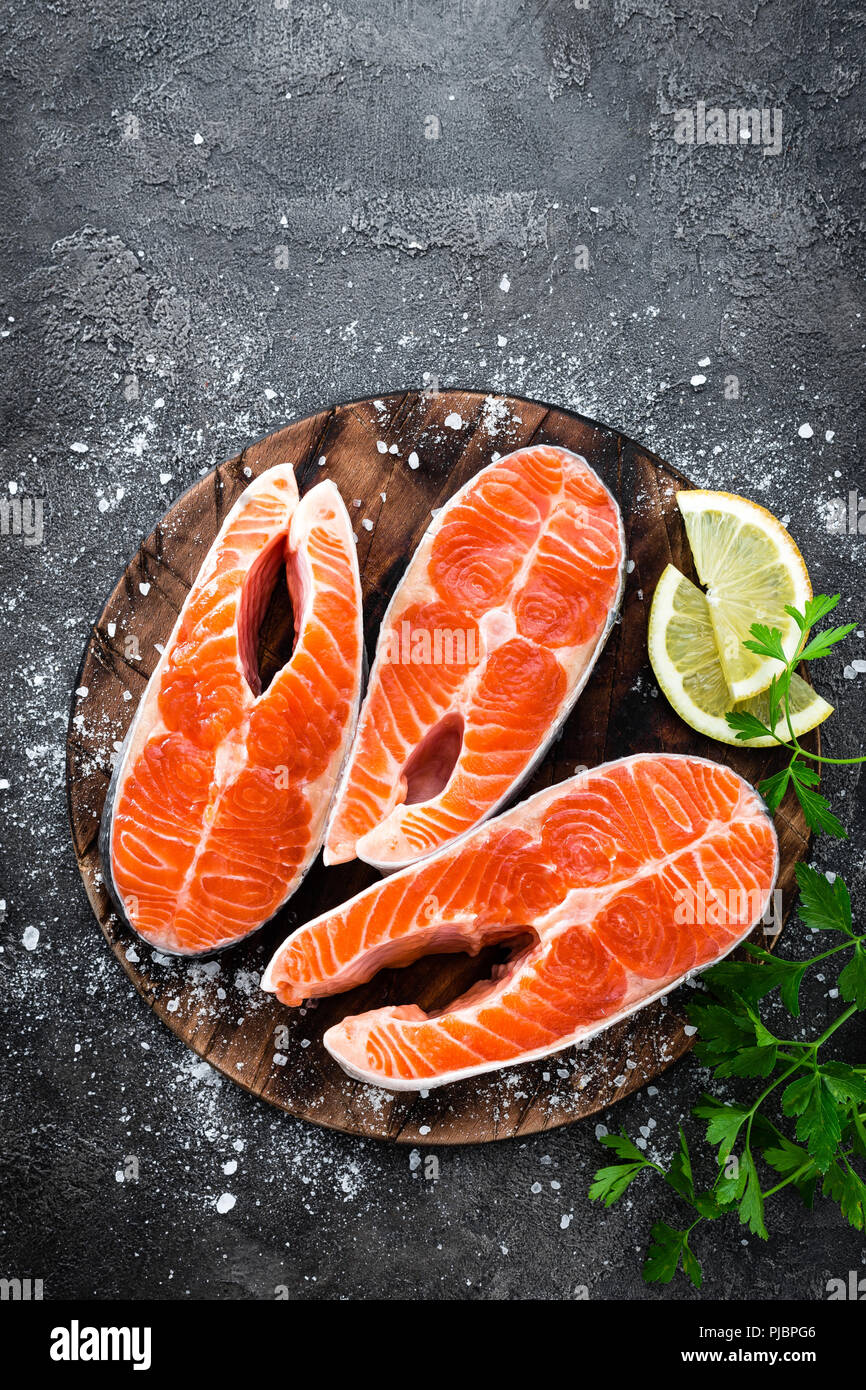 Raw salmon fish. Fresh salmon steaks Stock Photo - Alamy