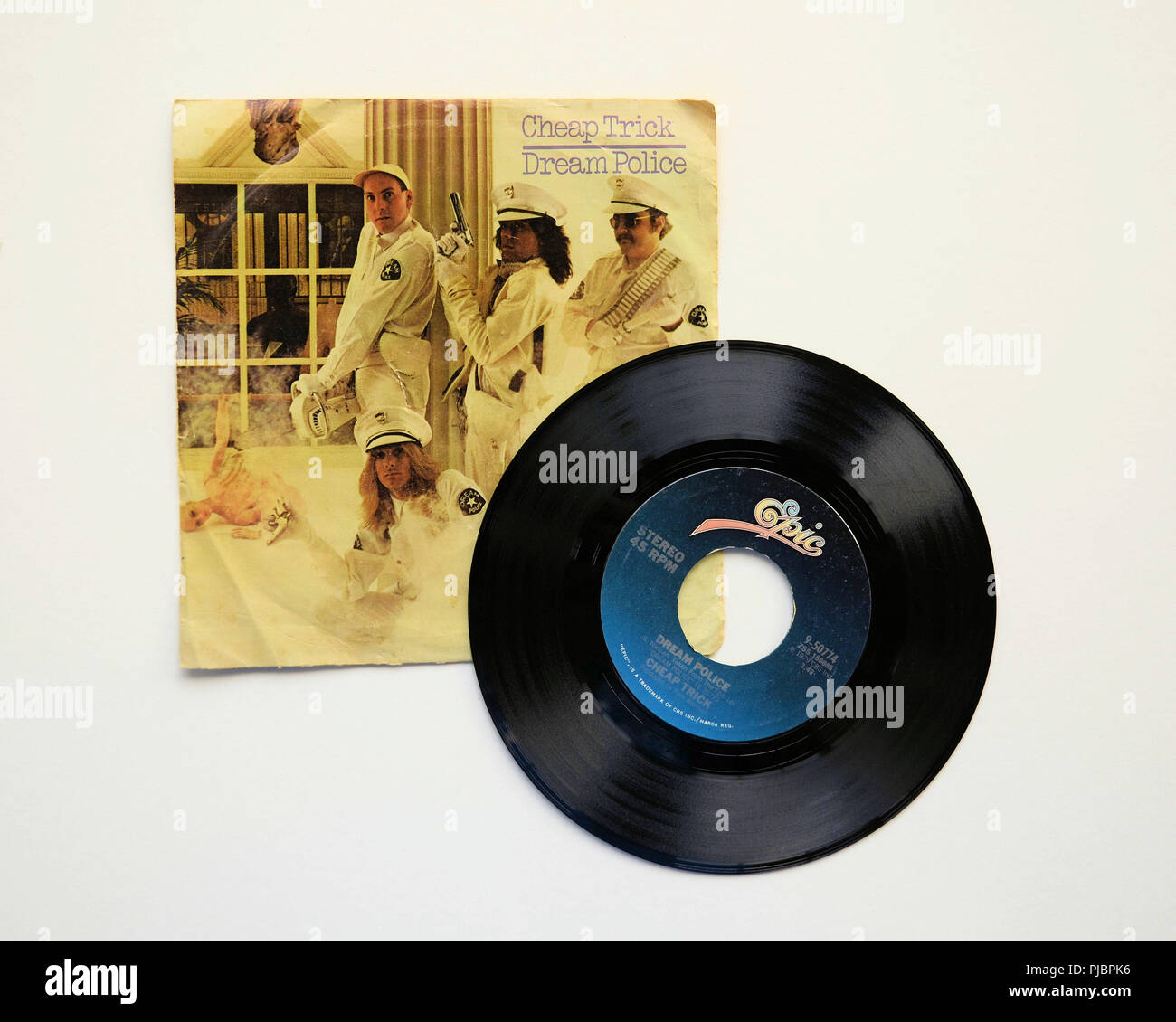 Sleeve and the 45 RPM vinyl record of Cheap Trick's song "Dream Police