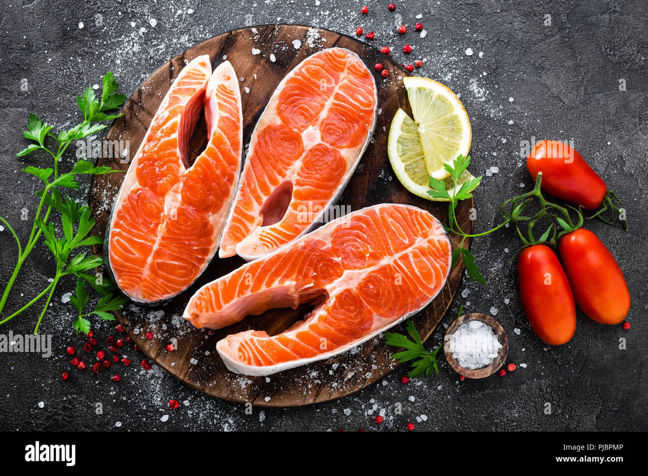 Raw salmon fish. Fresh salmon steaks Stock Photo - Alamy