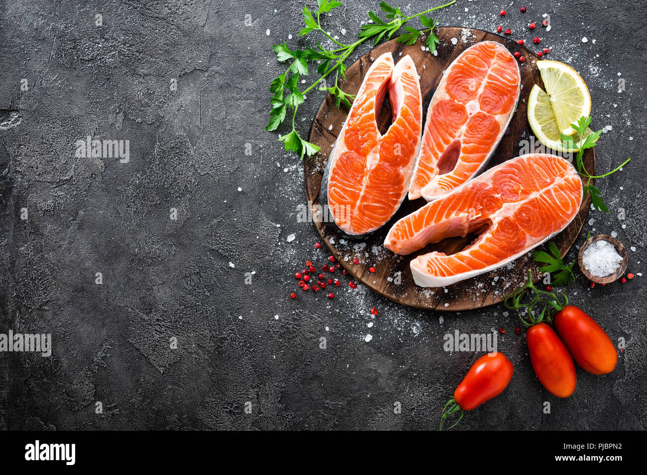 Raw salmon fish. Fresh salmon steaks Stock Photo - Alamy