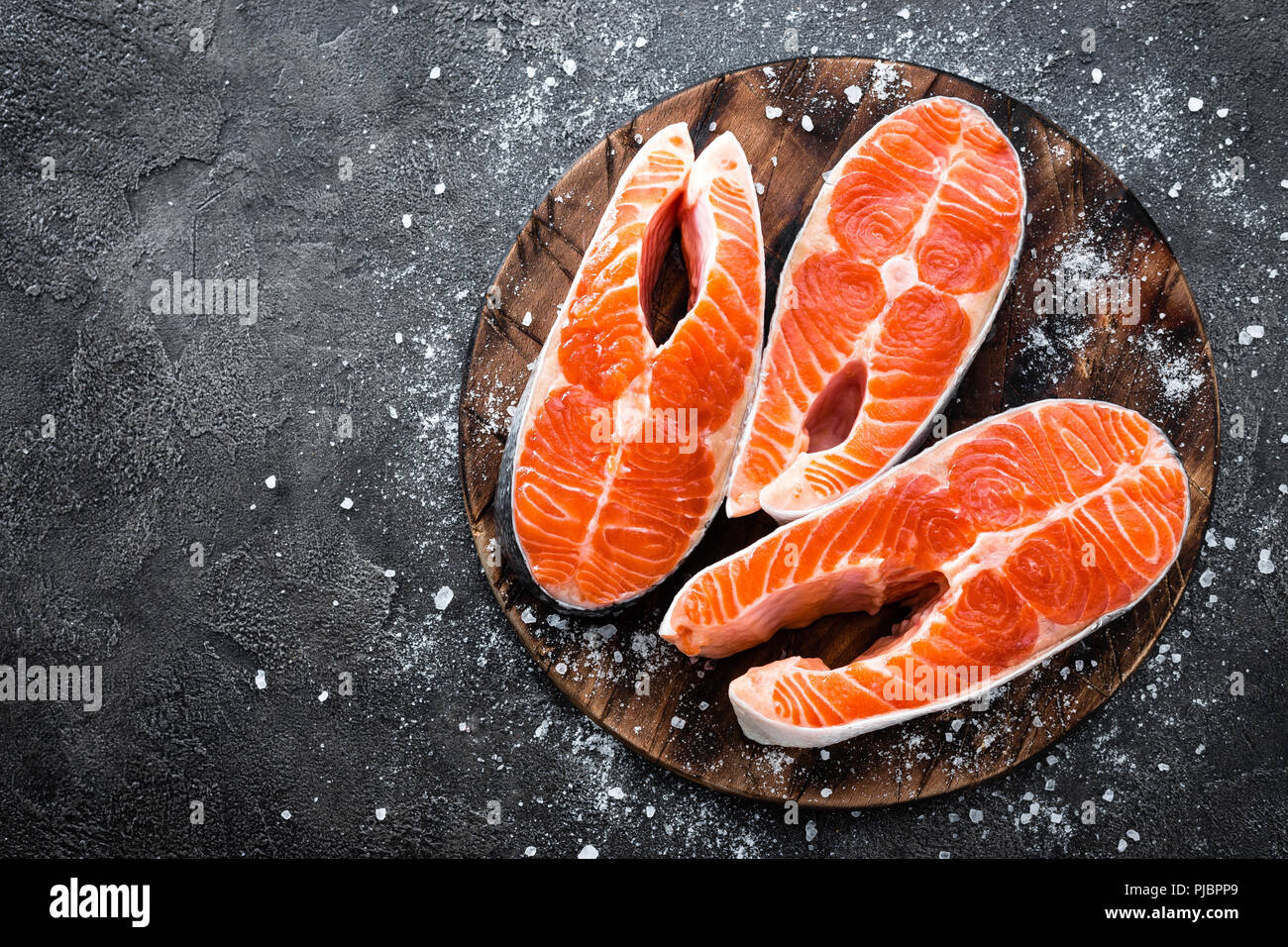 Raw salmon fish. Fresh salmon steaks Stock Photo - Alamy