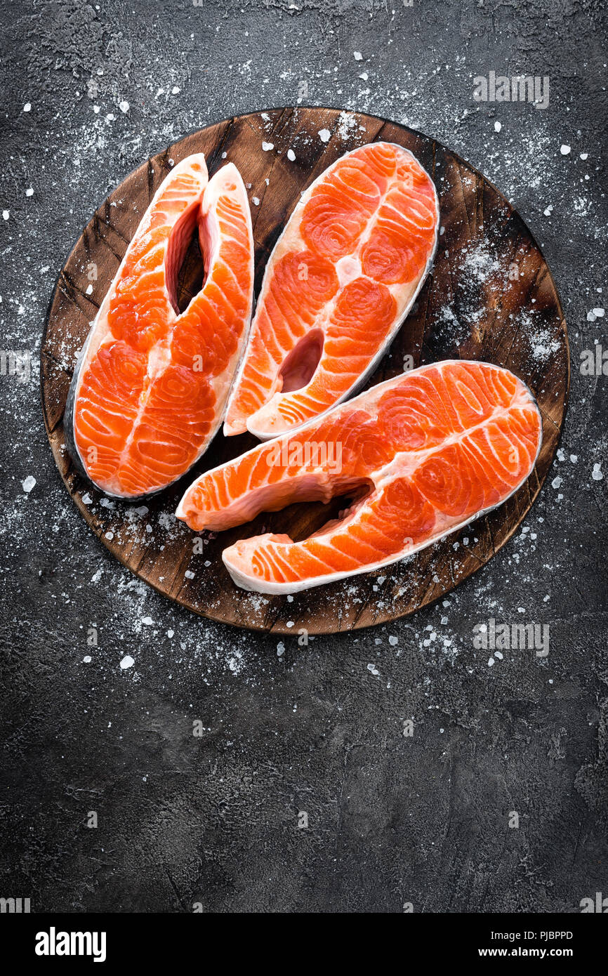 Raw salmon fish. Fresh salmon steaks Stock Photo - Alamy