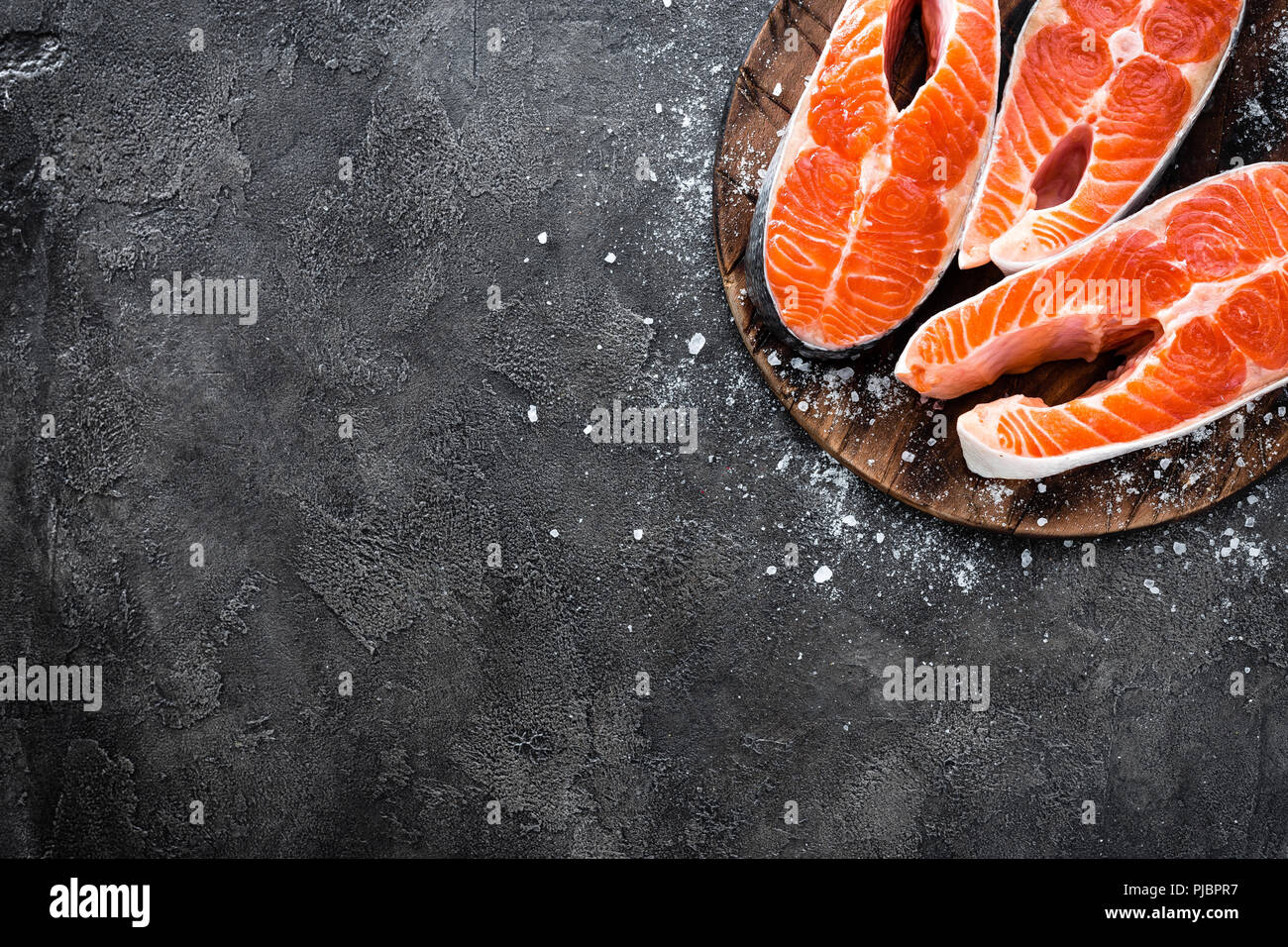 Raw salmon fish. Fresh salmon steaks Stock Photo - Alamy