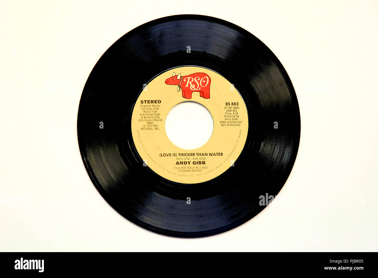 45 RPM vinyl record of Andy Gibb's song "(Love is) Thicker than Water" released in 1977 by RSO Records. Stock Photo
