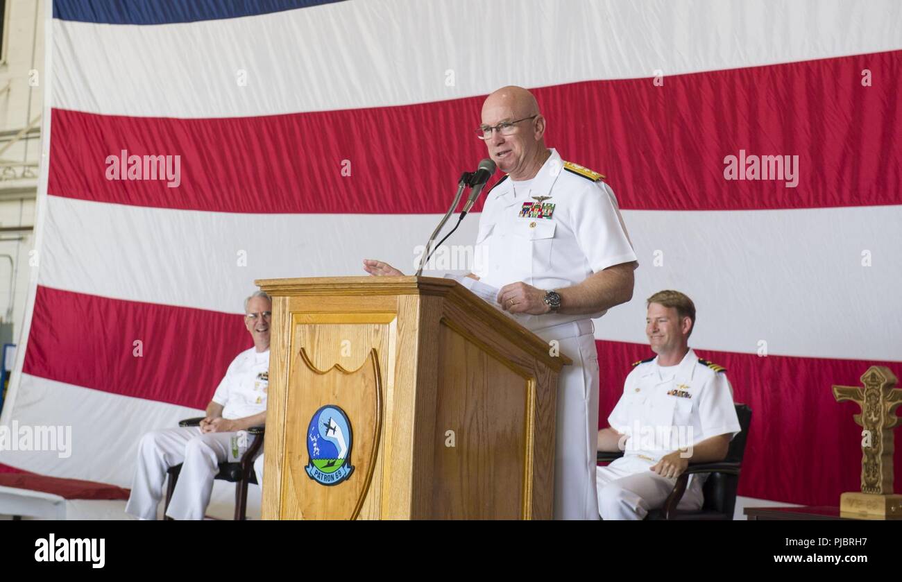 OAK HARBOR, Wash. (July 14, 2018) Rear Adm. W. Michael Crane, commander, Naval Air Force Reserve, speaks as the guest of honor during the change of command ceremony for Patrol Squadron (VP-69) held at Naval Air Station Whidbey Island. Cmdr. Scott W. Paul relieved Cmdr. Peter M. Lauder as commanding officer of the 'Totems' of VP-69. Stock Photo