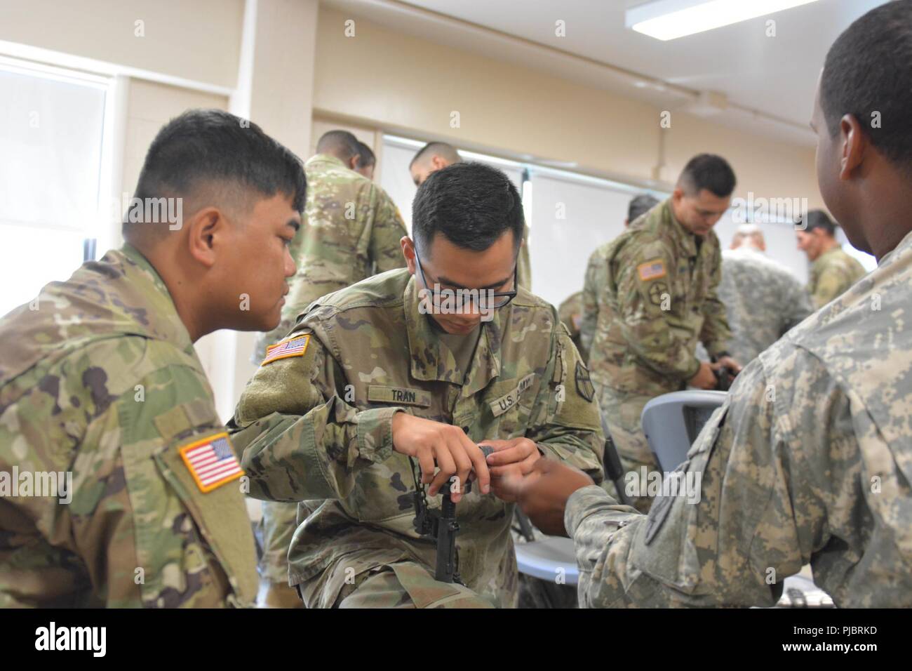 U.S. Army Reserve Troop List Unit Soldiers disassemble an M240B machine gun during Operation Cold Steel II, July 9, 2018 at Joint Base McGuire-Dix-Lakehurst, N.J. Operation Cold Steel is the U.S. Army Reserve’s crew-served weapons qualification and validation exercise to ensure America’s Army Reserve units and Soldiers are trained and ready to deploy on short notice as part of Ready Force X and bring combat-ready and lethal firepower in support of the Army and our joint partners anywhere in the world. Stock Photo