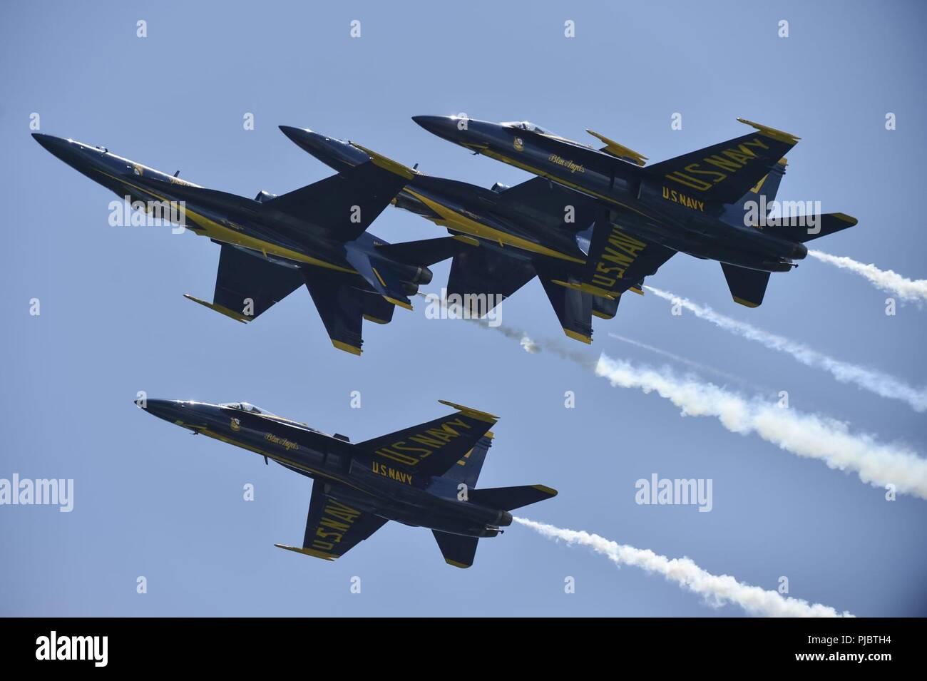 PENSACOLA BEACH, Fla. (July 13, 2018)   The U.S. Navy flight demonstration squadron, the Blue Angels, perform the Double Farvel during the 2018 Pensacola Beach Air Show. The Blue Angels are scheduled to perform more than 60 demonstrations at more than 30 locations across the U.S. and Canada in 2018. Stock Photo