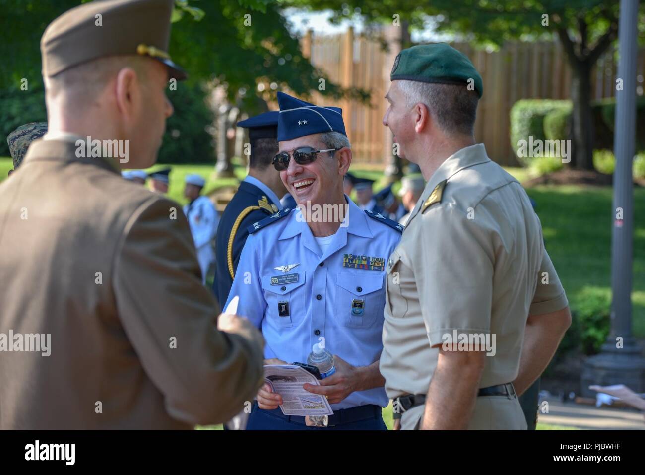 Foreign military officers arrive at the Joint Base Anacostia-Bolling Parade as the base celebrates its 100th Anniversary Jul 3, 2018. Bolling Field was officially dedicated on 1 July, 1918, after the property was purchased by the War Department and turned over to the Aviation Section of the Signal Corps to serve as the primary aviation facility for the capital city. This new military property was appropriately named for Colonel Raynal C. Bolling, an early vanguard in the quest for Army airmanship. Stock Photo