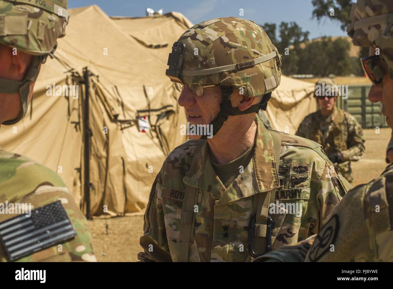 FORT HUNTER LIGGETT-- U.S. Army Reserve Maj. Gen. A. Ray Royalty visits various units during the 91st Training Division's Combat Support Training Exercise on Ft. Hunter Liggett, California, July 17, 2018. The CSTX 91-18-01 ensures America’s Army Reserve units are trained to deploy bringing capable, combat-ready, and lethal firepower in support of the Army and our joint partners anywhere in the world. Stock Photo